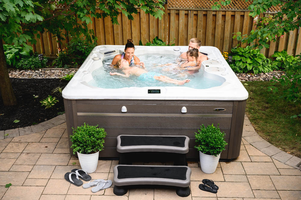 Hydropool Hot Tubs Signature Collection 720 Hot Tub with family